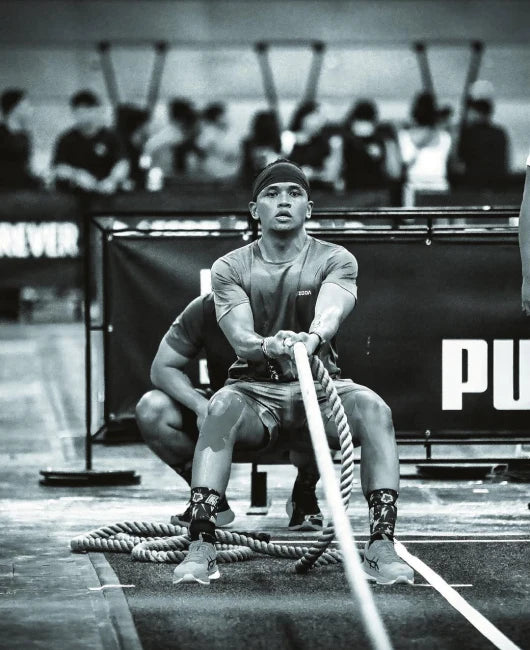 ZODA athlete pulling battle rope