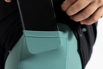 Close-up of a teal performance wear pocket